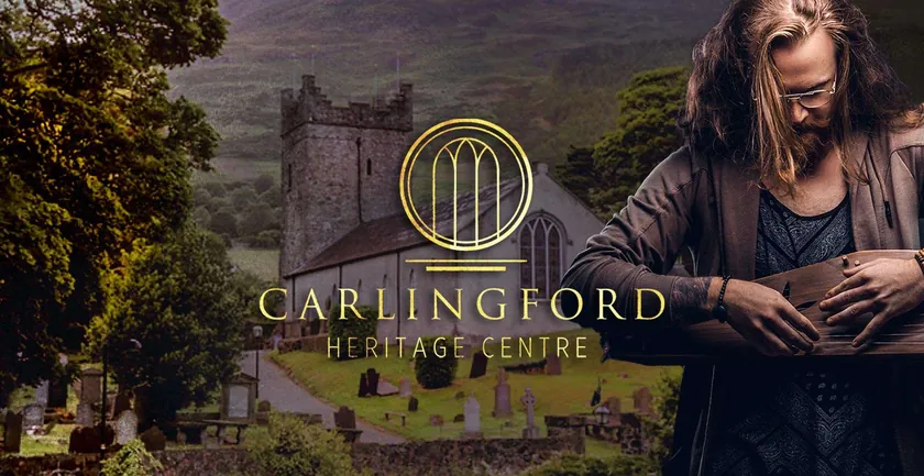 Carlingford Heritage Centre gold logo with the historic church and a musician