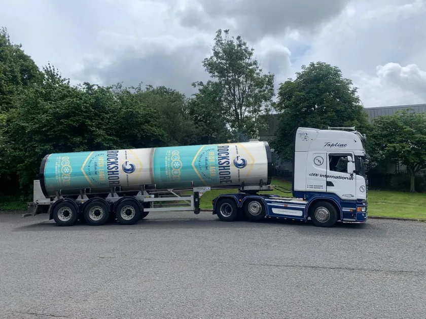 Rockshore tanker wrap concept using two oversized turquoise and cream lager can designs