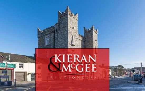 Kieran & McGee Auctioneers logo over a view of Ardee Castle