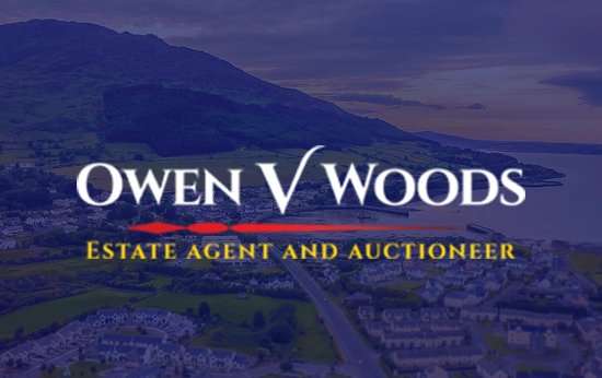 Owen V Woods estate agent and auctioneer logo over Carlingford Lough
